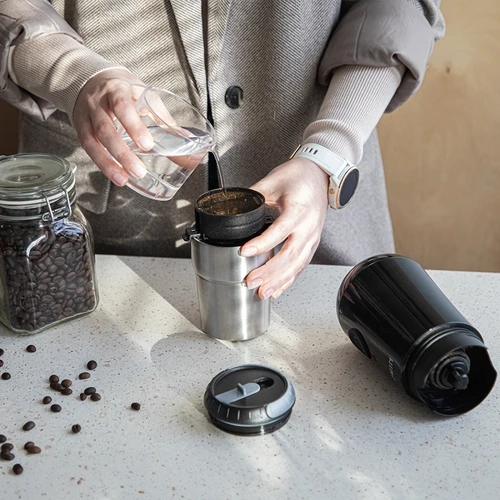 Koffiemolen - elektrisch, maalschijf, met zetapparaat en beker - 17