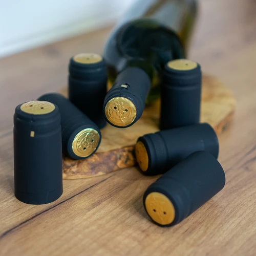 Krimpkappen met perforatie zwart fi31mm 100st. - 2