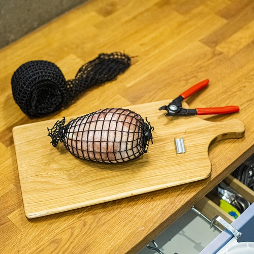 Zwart vleeswaren net met afmetingen 18 cm x 5 m, met thermische weerstand tot 220°C - 5